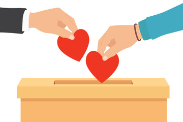 Donation box and charity concept. Hands putting red heart to donation box