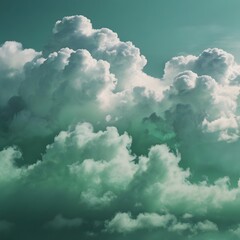 Fototapeta premium Green and White Cloud Formations in Bright Sky with Soft Lighting