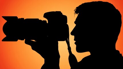 A silhouette of a person holding a camera against a warm orange sunset background
