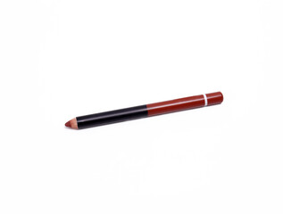 A Sleek Brown cosmetic pencil, perfect for makeup application, isolated on a white background.