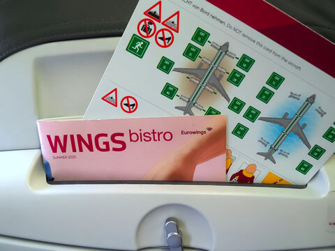 Eurowings safety card on board of a airplane