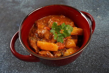 Chicken stew with potatoes in tomato sauce