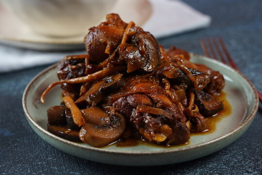 Deep fried chicken with mushrooms ,onions and  date syrup.