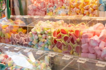 Selection of marshmallow, jelly, gummy and other sweets in the market