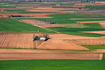 Agricultural industry. Farms in productive fields. Spain