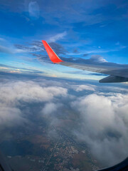 A scenic aerial view taken from a commercial airplane window. 