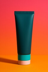 Dark green tube with colorful cap on orange background