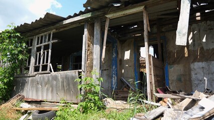 View to destroyed residential buildings at Kharkivska oblast. Ruined houses after bomb attacks on ukrainian territory from russia army. Consequences of russian invasion of Ukraine. Slow motion