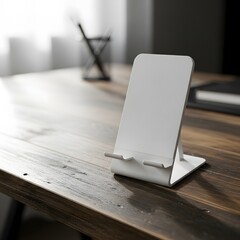 Modern white phone stand on a rustic wooden office desk in a minimalist workspace