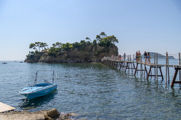 Scenic View of Cameo Island with Wooden Footbridge in Zakynthos, Greece