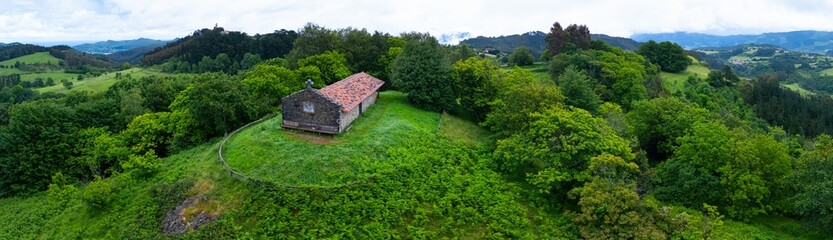 Fototapeta premium Aerial view from a drone of the Santa Gurutze hermitage in Biscay in the province of Bizkaia in the autonomous community of the Basque Country. Spain. Europe