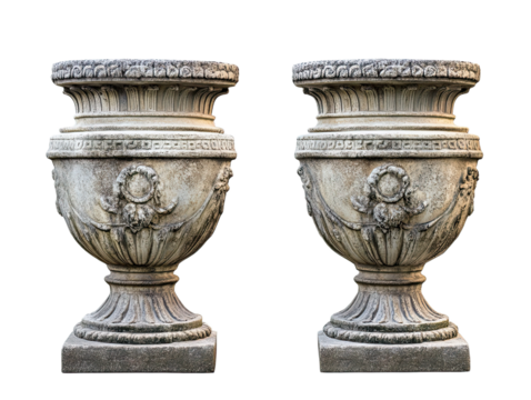 Two antique ornate stone urns with decorative carvings isolated on transparent background