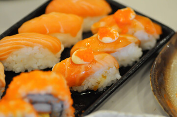 salmon sushi ,sushi or rice topped with salmon or salmon roll
