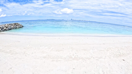 tropical beach with blue sky