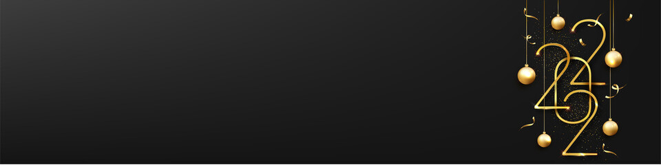 Elegant gold 2022 new year greeting with festive decorations and sparkling confetti