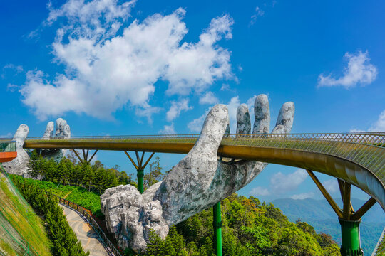 Famous tourist attraction among the tropical jungle in the forests - empty golden bridge