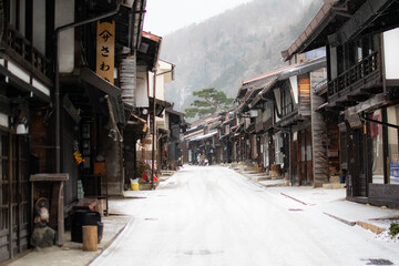 Fototapeta premium Snowy street in the rural and traditional town of narai in japan