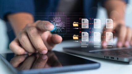 Close-up of a hand using an AI document processing system on a touch screen interface. Concept of data automation, smart file analysis, and digital document sorting.