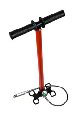 A red and black high-pressure manual pump featuring a pressure gauge and hose, isolated against a white background.