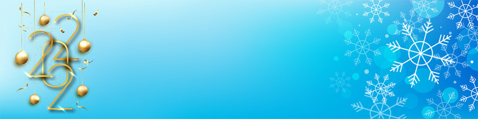 Golden 2022 numbers with baubles and snowflakes on a blue gradient background