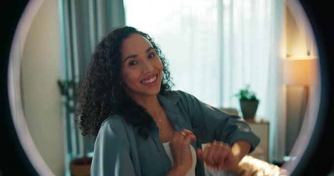 Dancing, influencer and face of woman in home for video recording, tutorial or broadcast. Happy, music and female content creator with rhythm for vlog, new trend or social streaming in living room.