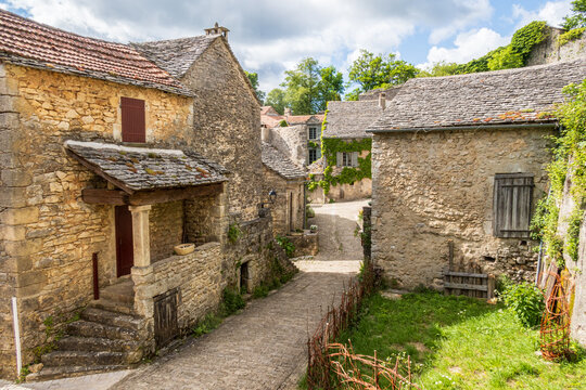 Fototapeta Photo of the old stones from a street in the medieval village of La Couvertoirade in France, Aveyron