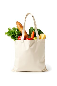 Reusable White Cotton Tote Bag Filled with Fresh Groceries, Isolated on White