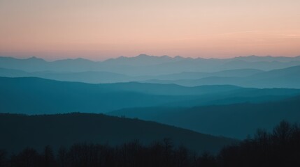 Dramatic mountain silhouette against gradient sunset sky, ideal for book covers, motivational posters, environmental campaigns, and screensavers