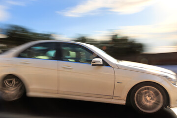 white car going on the road, with panning technique, istanbul
