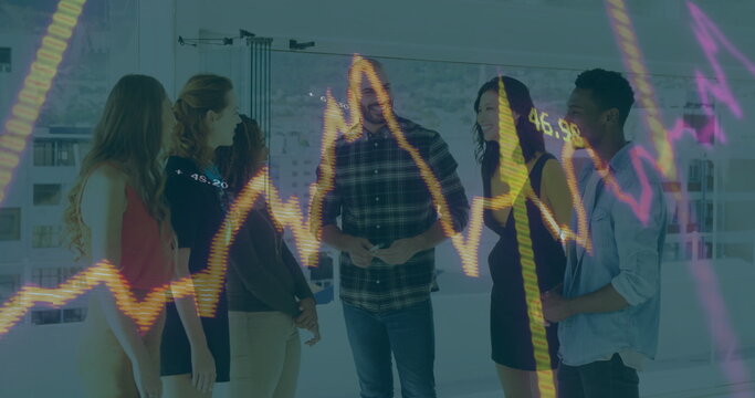 Group of five professionals discussing financials in meeting area with window, floating stock chart