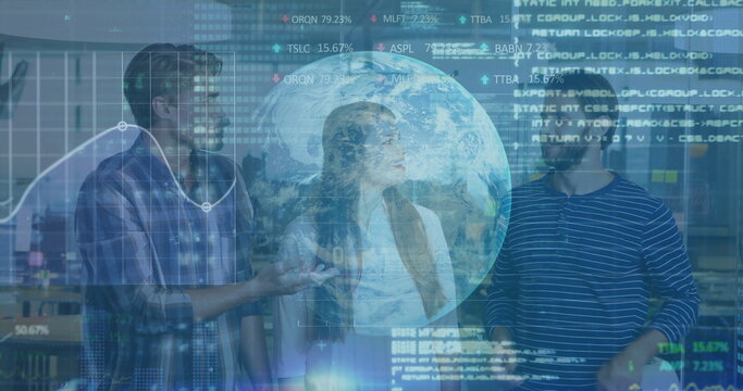 Gesturing tech team examining financial overlays in modern office, holographic globe projection