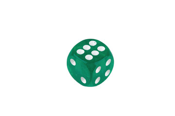 Close-up of a single genuine used green colored semi-transparent dice