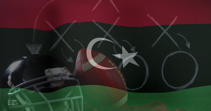 Displaying American football helmet and ball on chalkboard play diagram, with Libyan flag overlay