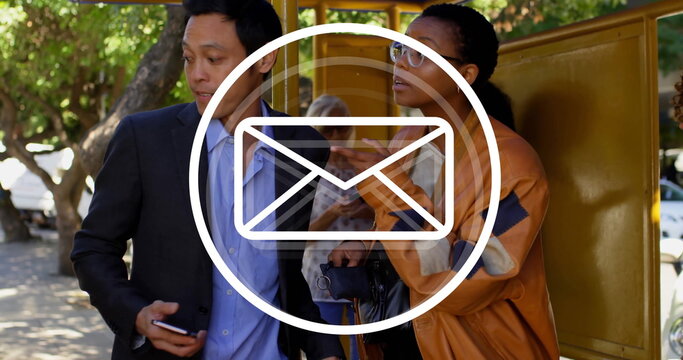 Five commuters in business attire checking smartphones at yellow transit shelter, with bicycle - Powered by Adobe
