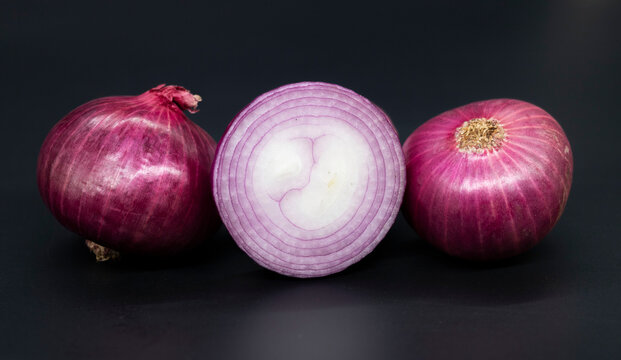 Onion, isolated on black background, closeup