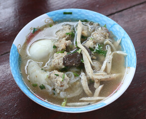 Delicious Kuay Chap with egg in a bowl