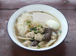 Delicious Kuay Chap with egg in a bowl
