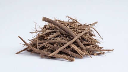 Fototapeta premium Pile of Licorice Roots: A close-up shows dried licorice roots, revealing their texture and color, often used for flavoring and medicinal purposes.