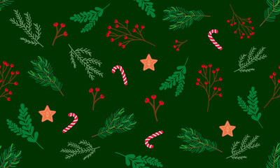 Seamless New Year's pattern with leaves, rowan berries, lollipops and a star on a green background.Vector graphics for fabric,packaging,wallpaper