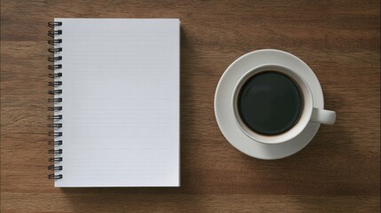 Minimalist workspace with a notebook and coffee cup, arranged neatly from a top-down view.