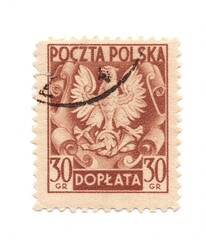 A vintage postage stamp from Poland isolated on a white background.