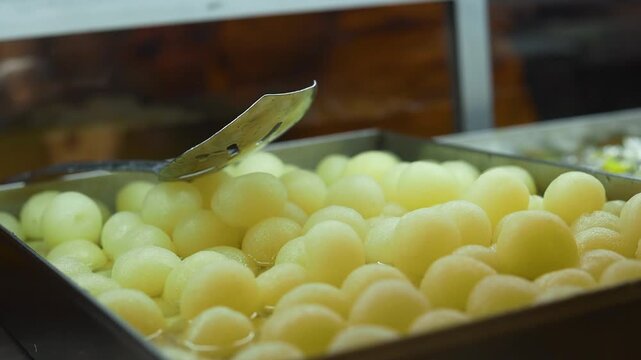 Rasgulla an indian dessert white balls dipped in sugar syrup