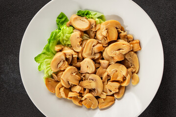 champignon slices canned mushrooms salad fresh delicious gourmet food background on the table ...