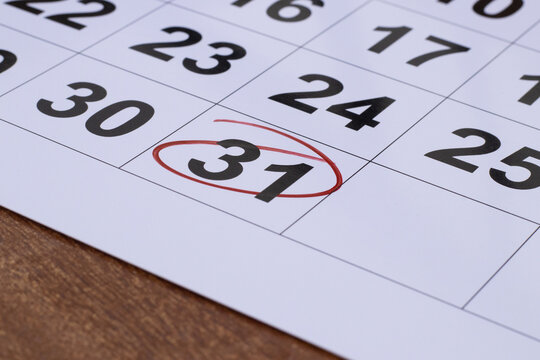 Number 31 circled in the calendar with red color marker to point important date