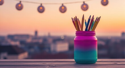 Sunset creativity: A vibrant pencil jar reflecting urban dreams and artistic inspiration