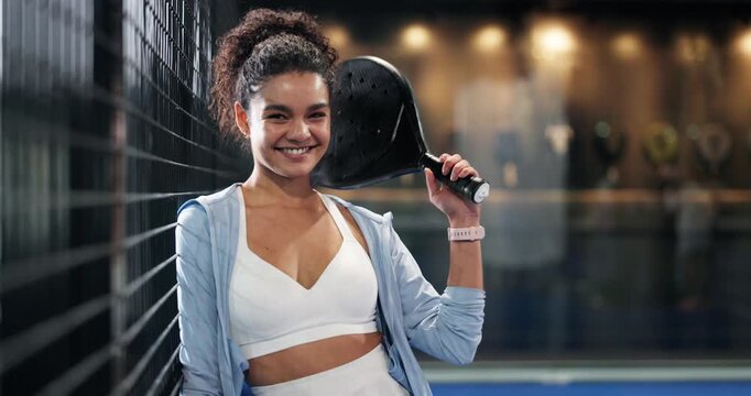 Face, athlete and woman with racket for padel tennis, sports training and competition on court. Portrait, female person and happy for fitness, game preparation and match practice of tournament event