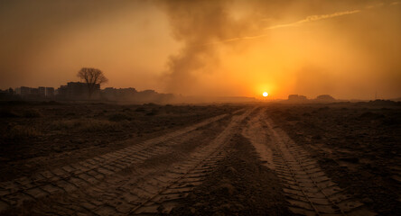 sunset over the war battlefield field
