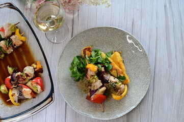 Colorful grilled chicken skewer with vibrant vegetables as a delicious food background. 