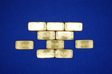Gold bars, gold color, containing 96.5 percent gold.