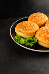 Bun burger puffy soft buns baking fresh delicious gourmet food background on the table rustic food top view copy space